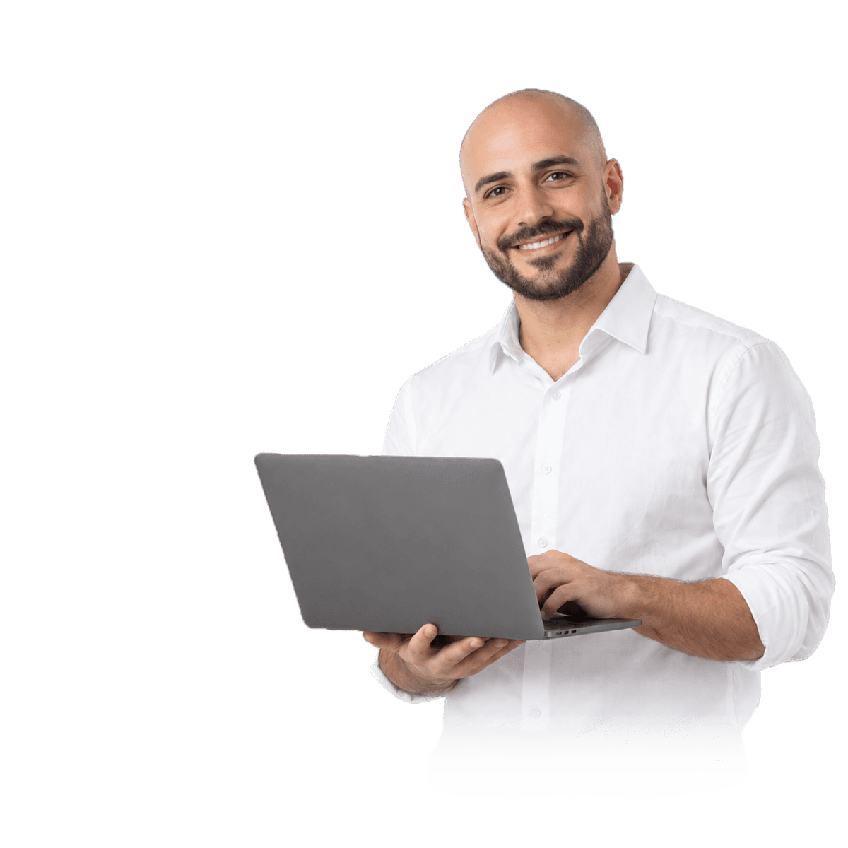Person in a white shirt working on a laptop