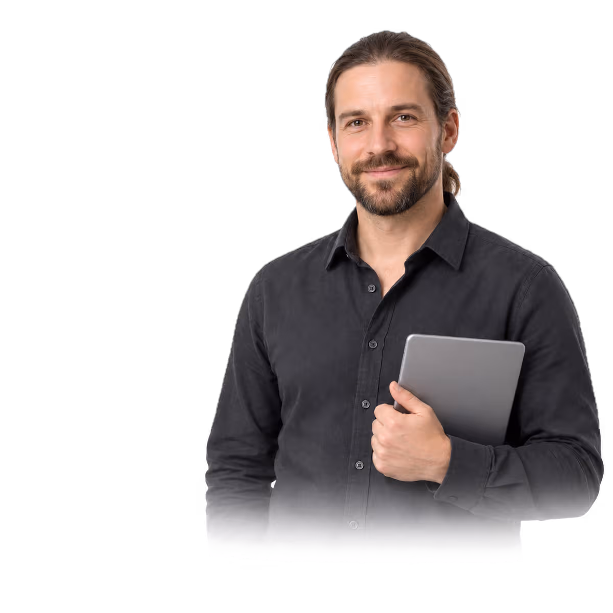 A man in a dark shirt holding a tablet
