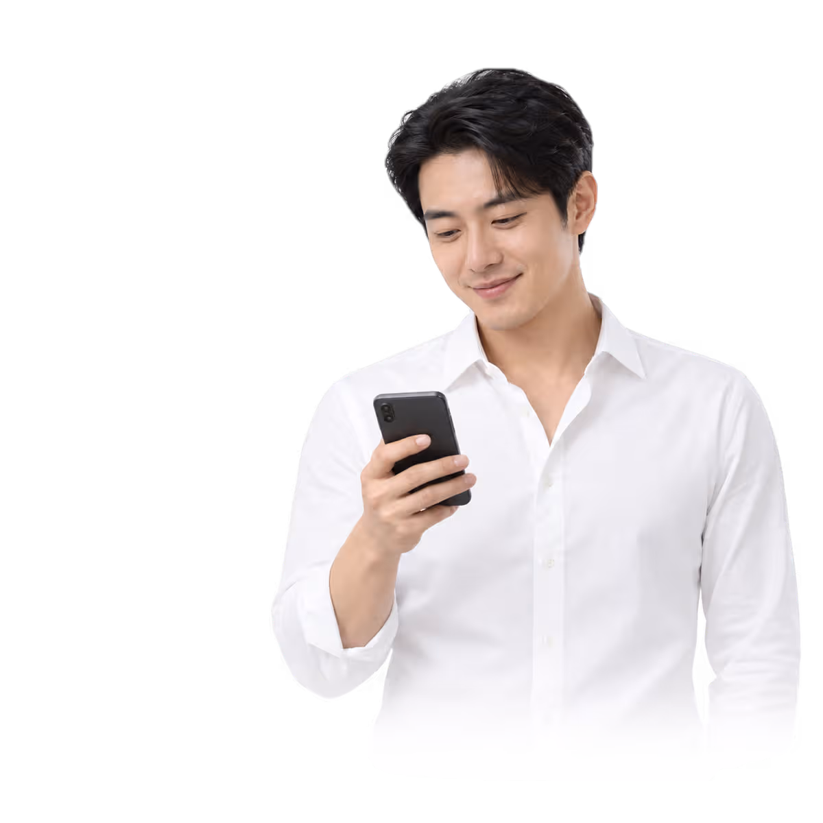 A man in a white shirt holding a phone